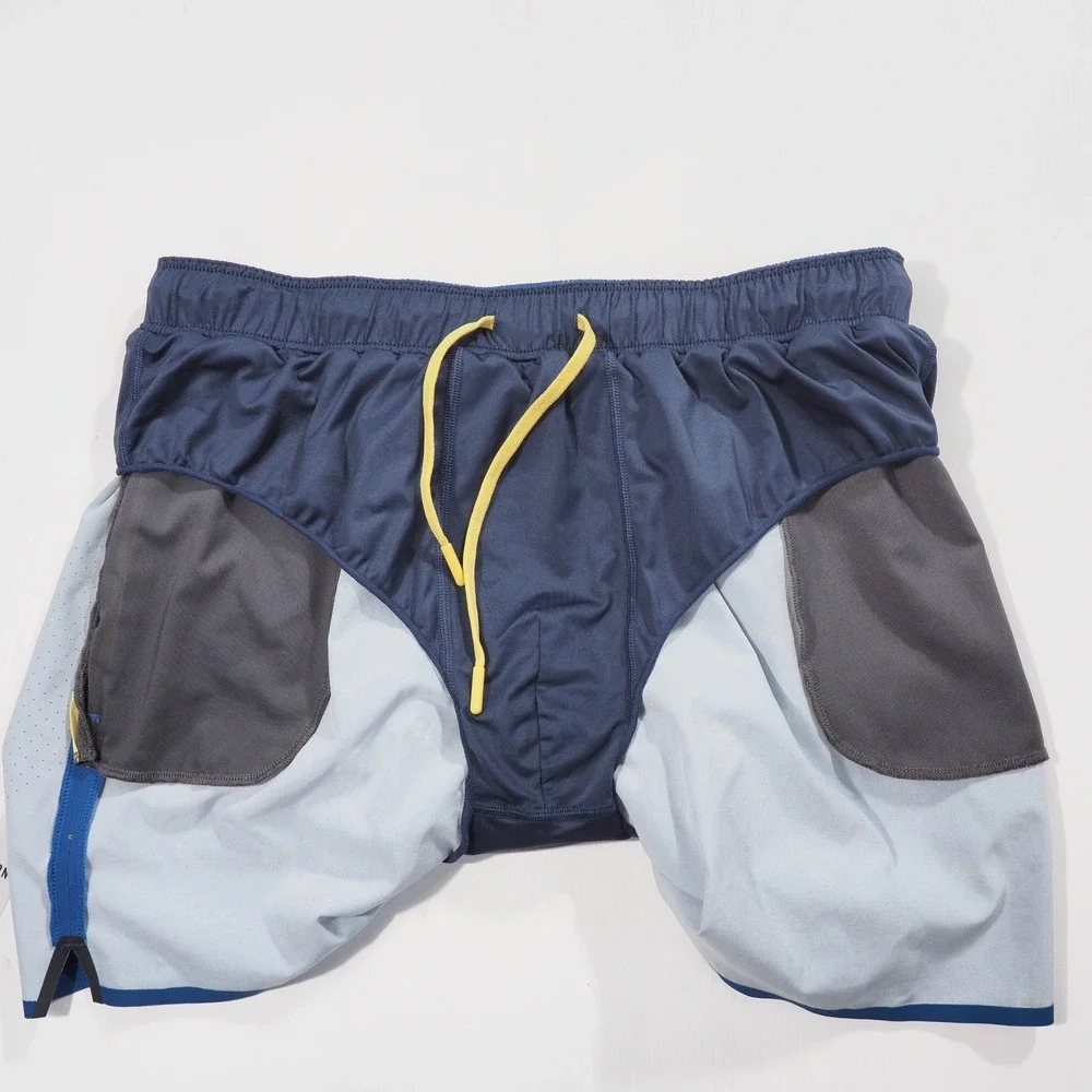 Rhone Swift Academy Shorts Men Medium Blue Winged Foot Print Lined Athletic Loop